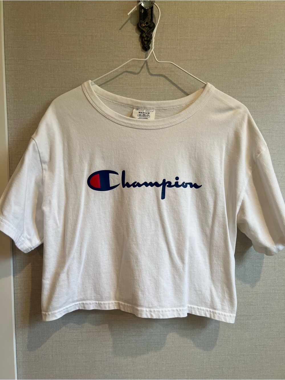 Champion White Cropped Logo T-Shirt with Navy and Red Emblem